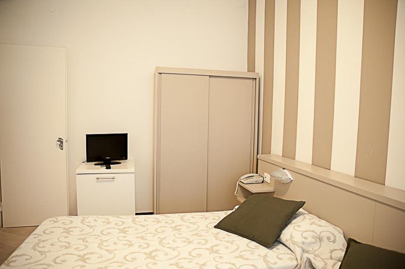 Postel nebo postele na pokoji v ubytování Hotel Bristol