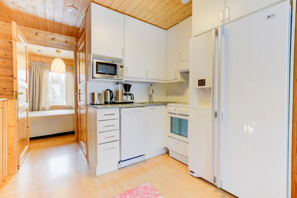 Kuchyň nebo kuchyňský kout v ubytování Pyhäkoti Holiday Home