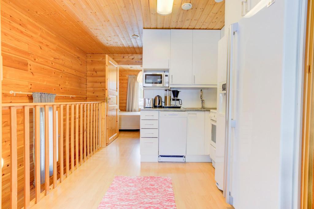 Kuchyň nebo kuchyňský kout v ubytování Pyhäkoti Holiday Home