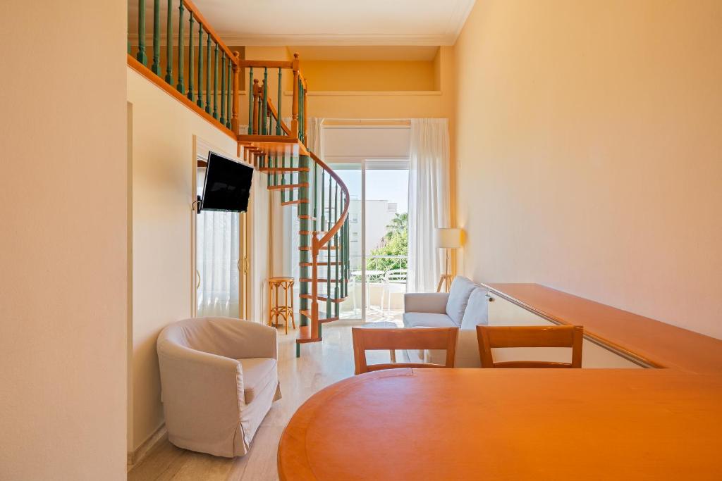 A seating area at MAREA Hotel