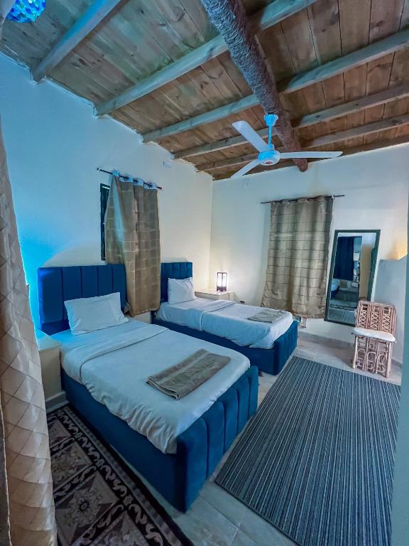 Postel nebo postele na pokoji v ubytování Siwa Shali Resort