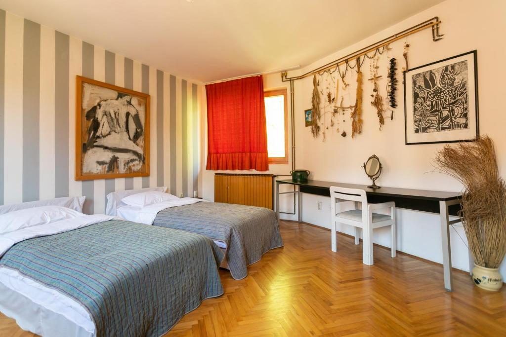 Postel nebo postele na pokoji v ubytování Apartmani SuperStar