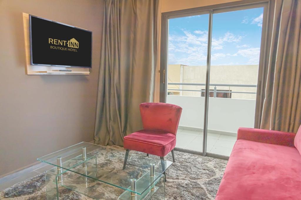 TV a/nebo společenská místnost v ubytování Rent-inn Boutique Hotel