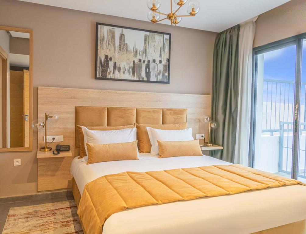 Postel nebo postele na pokoji v ubytování Rent-inn Boutique Hotel
