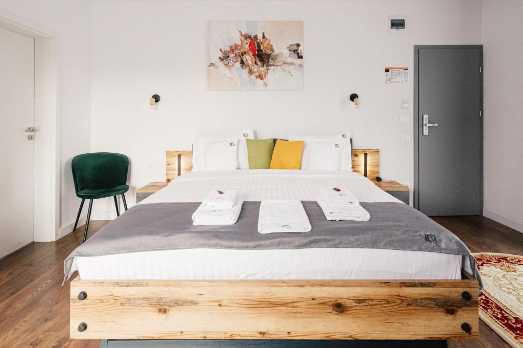 Postel nebo postele na pokoji v ubytování Hotel B4