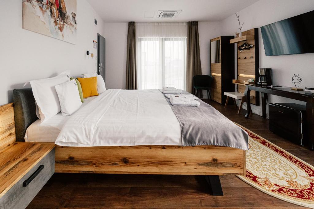 Postel nebo postele na pokoji v ubytování Hotel B4