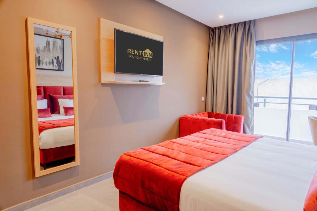Postel nebo postele na pokoji v ubytování Rent-inn Boutique Hotel