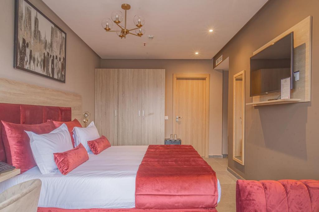 TV a/nebo společenská místnost v ubytování Rent-inn Boutique Hotel