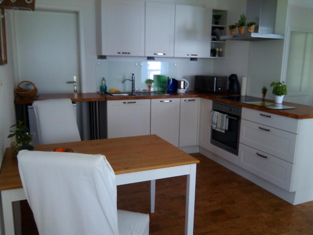Kuchyň nebo kuchyňský kout v ubytování Apartment Bei Linda