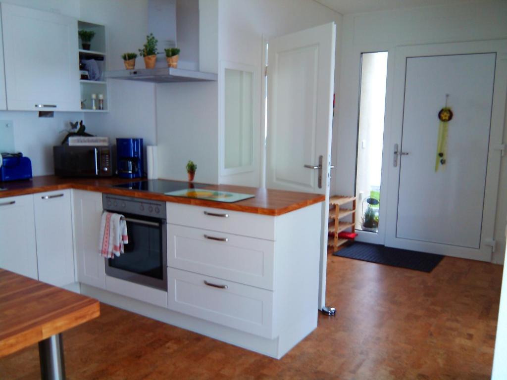 Kuchyň nebo kuchyňský kout v ubytování Apartment Bei Linda
