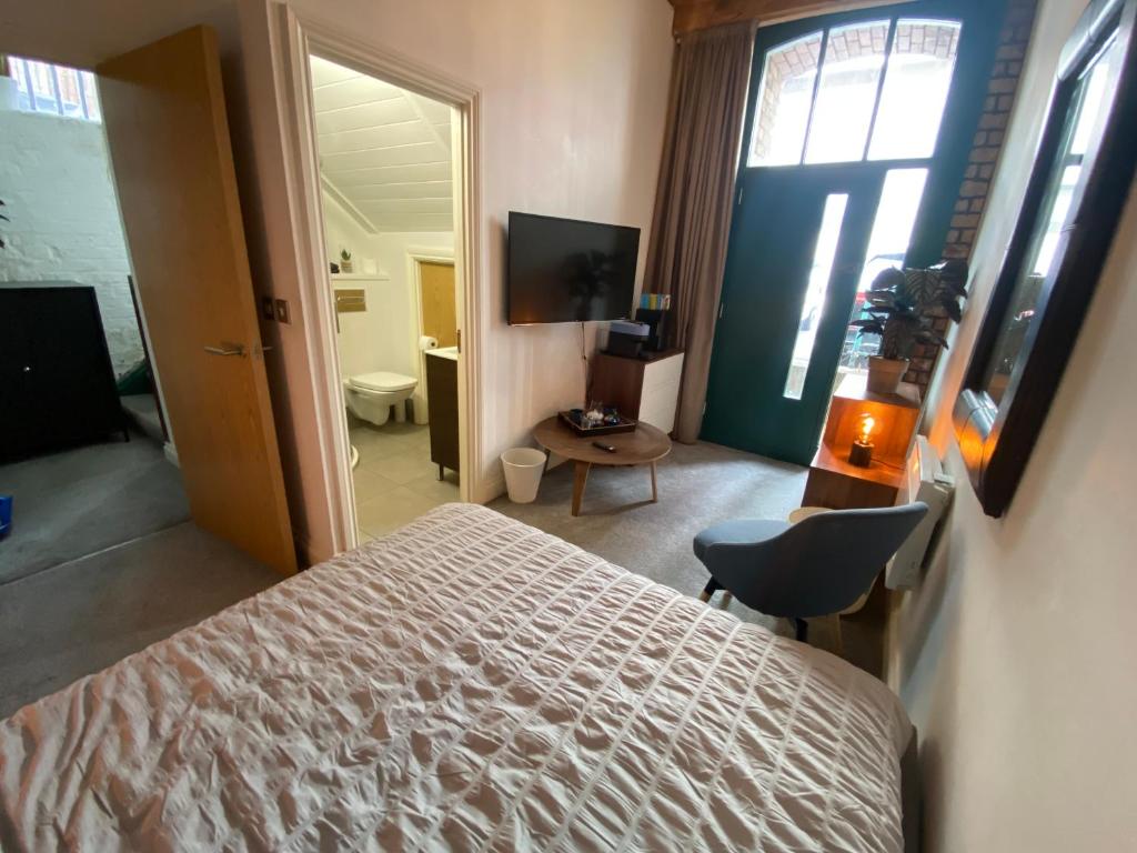 TV a/nebo společenská místnost v ubytování WE-stay
