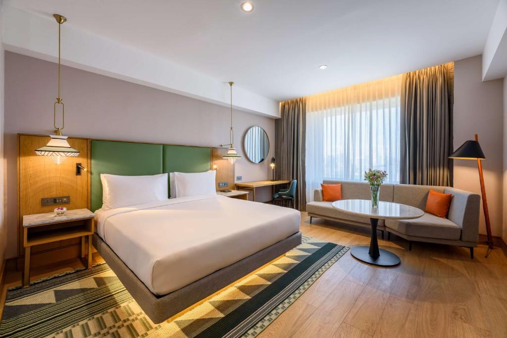 Postel nebo postele na pokoji v ubytování Hyatt Regency Nairobi Westlands