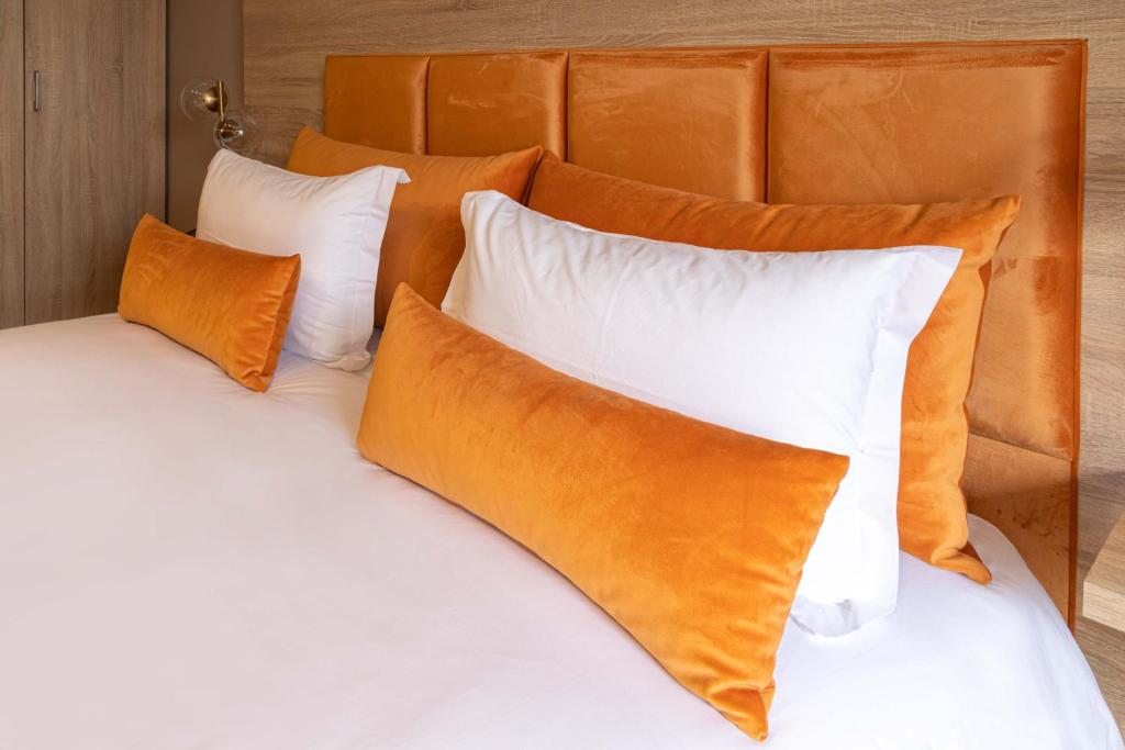Postel nebo postele na pokoji v ubytování Rent-inn Boutique Hotel