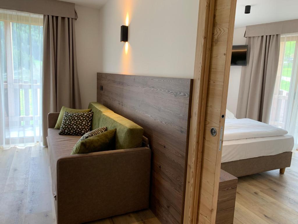 Postel nebo postele na pokoji v ubytování Hotel Miravalle
