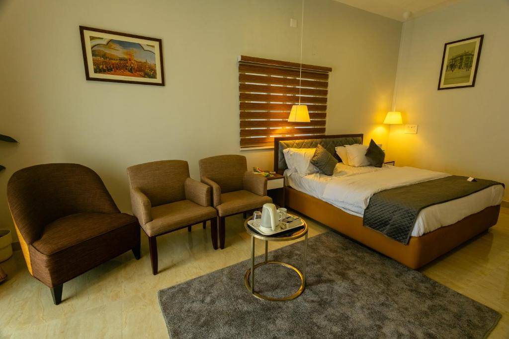 Postel nebo postele na pokoji v ubytování Breathe Resorts