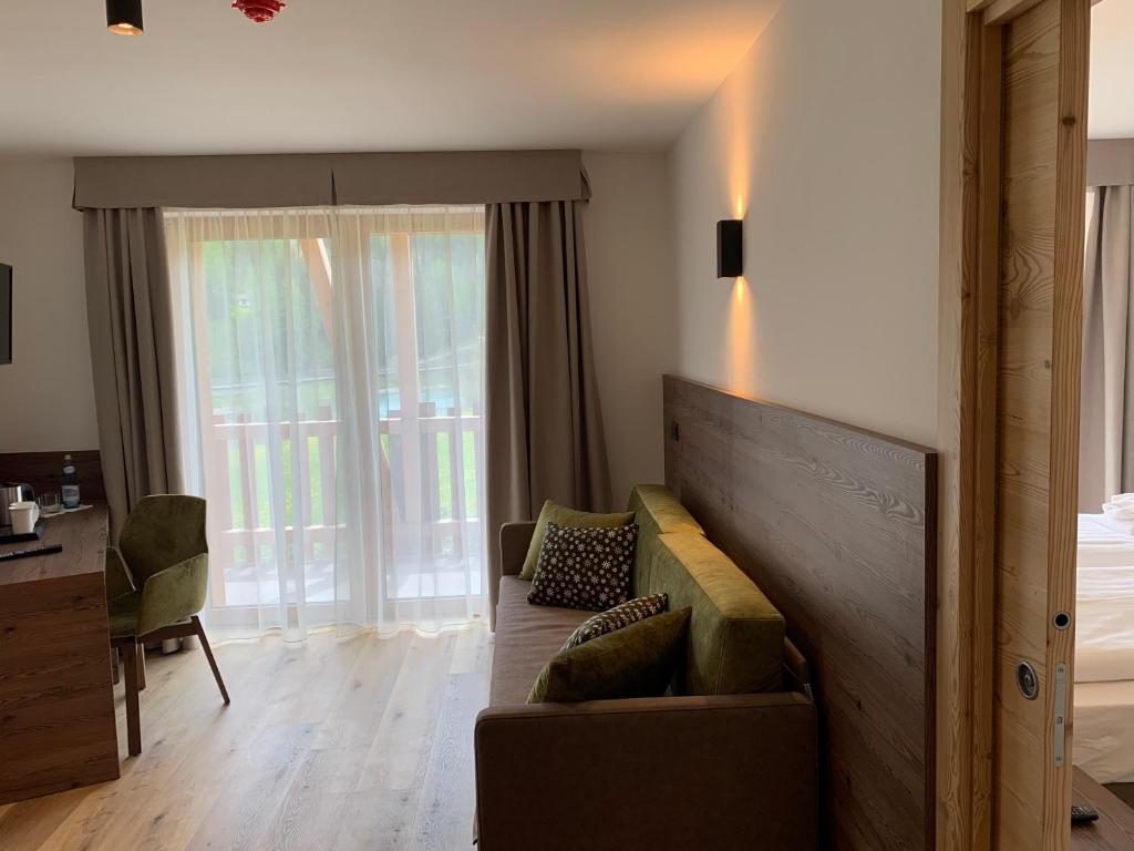 Postel nebo postele na pokoji v ubytování Hotel Miravalle