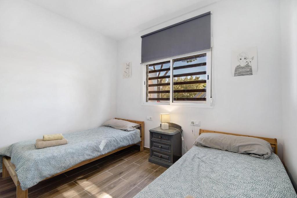 Postel nebo postele na pokoji v ubytování Spica
