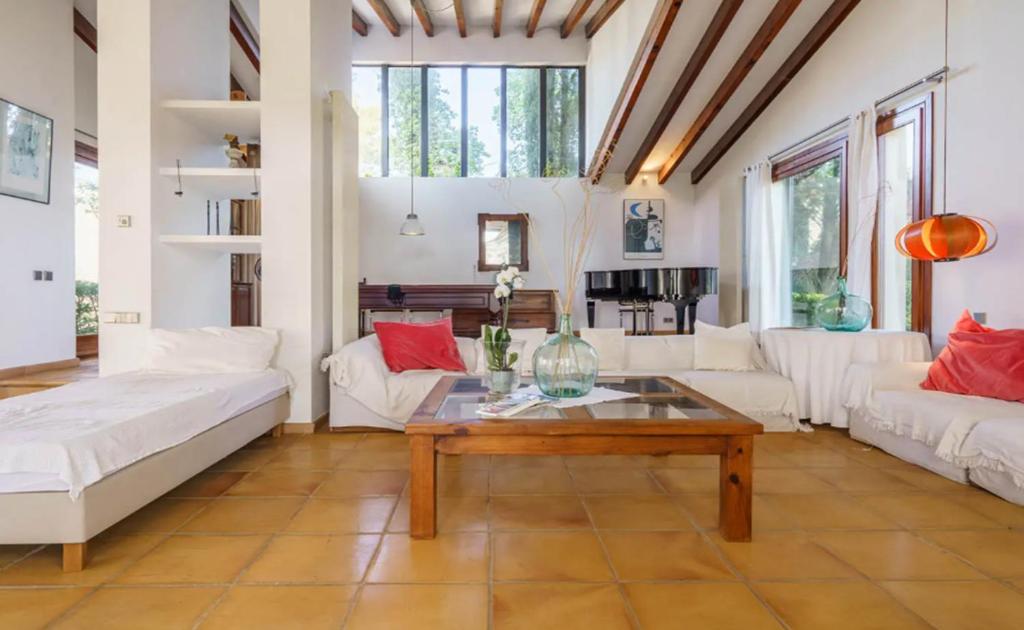 Postel nebo postele na pokoji v ubytování Villa Can Canaver