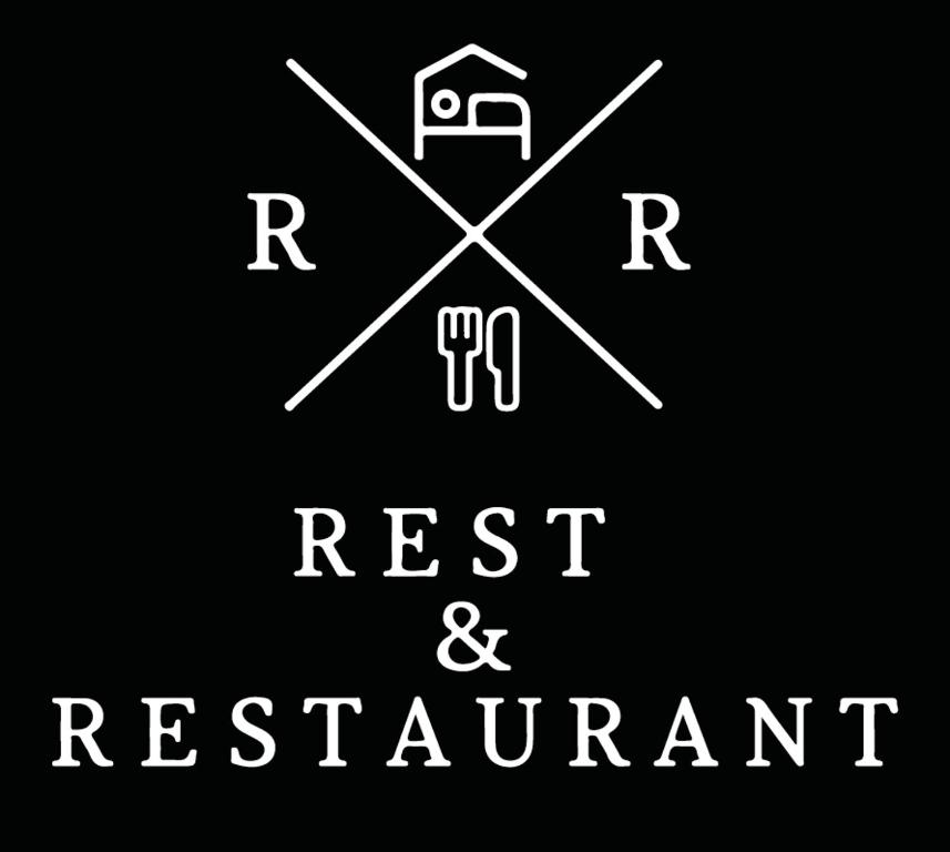 a sign with the words rest and restart at REST AND RESTAURANT in Roveredo in Roveredo