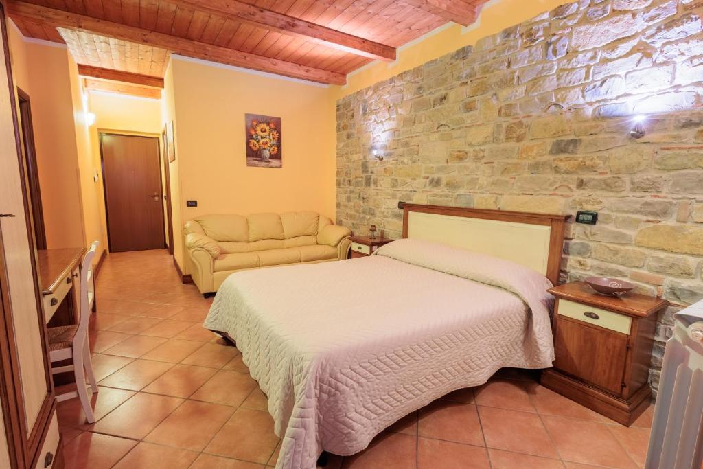 Postel nebo postele na pokoji v ubytování Green Park Bio Agriturismo