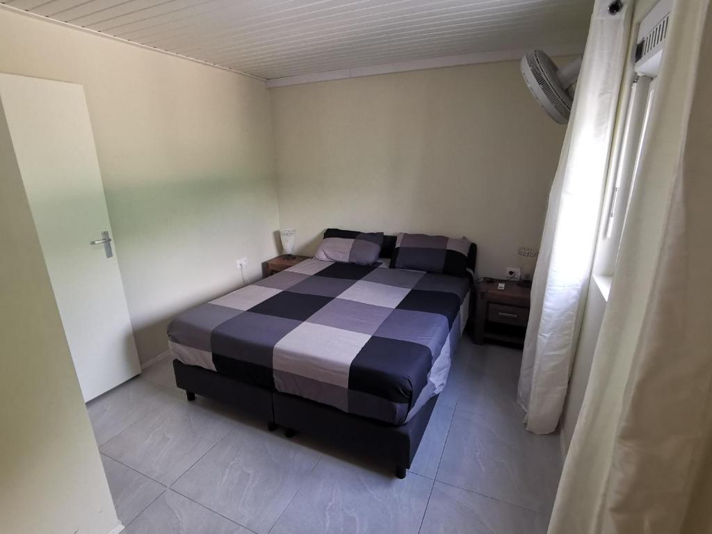 Postel nebo postele na pokoji v ubytování Guesthouse Fuik