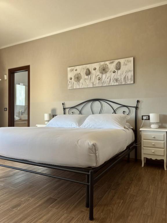 Postel nebo postele na pokoji v ubytování Casa Caimotta