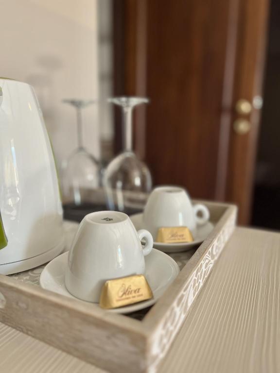 Příslušenství pro přípravu čaje a kávy v ubytování Casa Caimotta