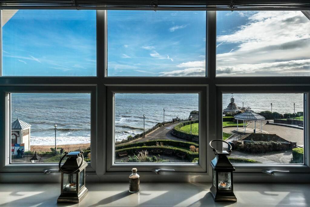 a view of the ocean from a window at Bay View - Private parking, beach views, central location in Kent