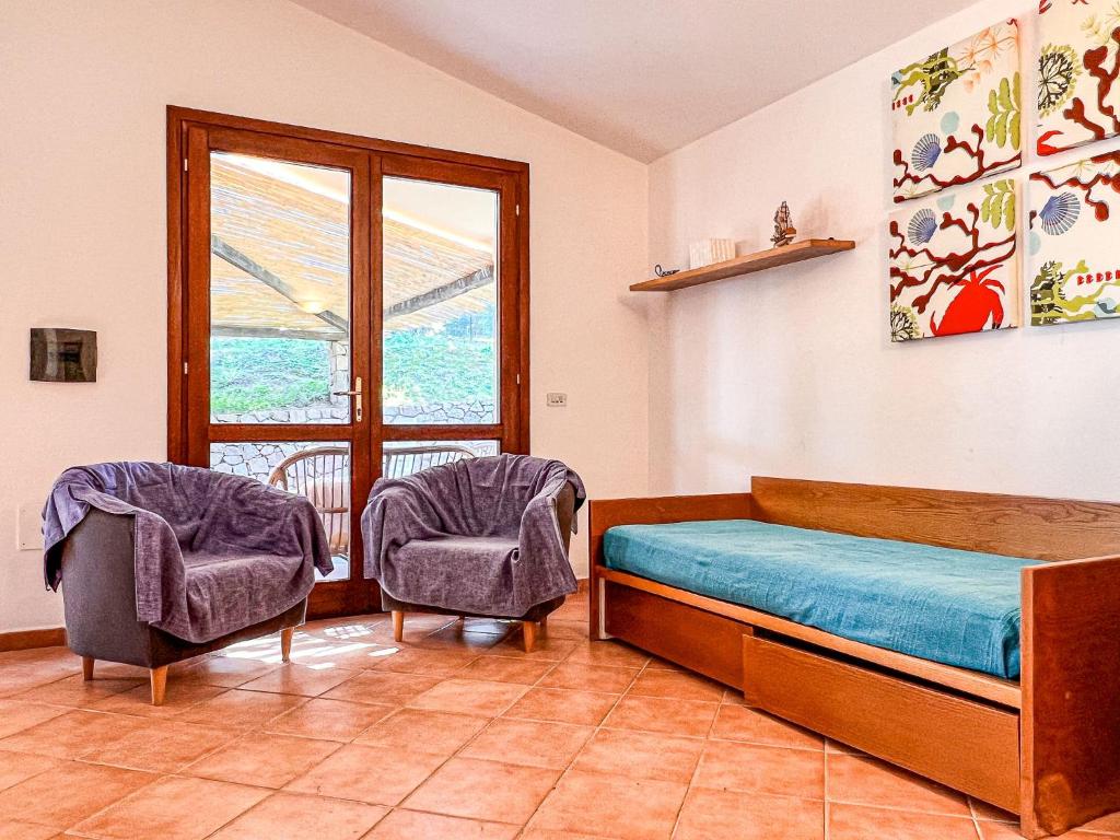 A bed or beds in a room at Villetta Gaia