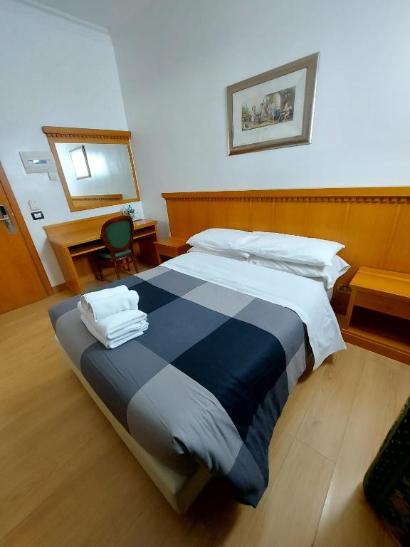 Letto o letti in una camera di Hotel Positano 2