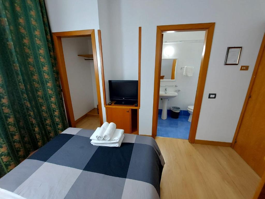 Letto o letti in una camera di Hotel Positano 2