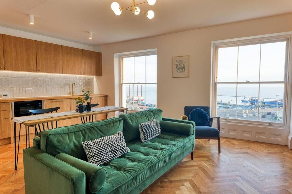 A seating area at The Lookout - Stylish penthouse with sea views