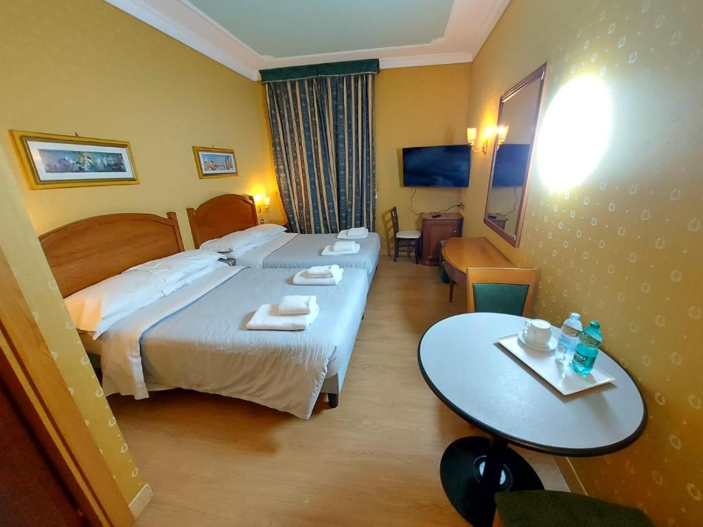 Letto o letti in una camera di Hotel Positano 2
