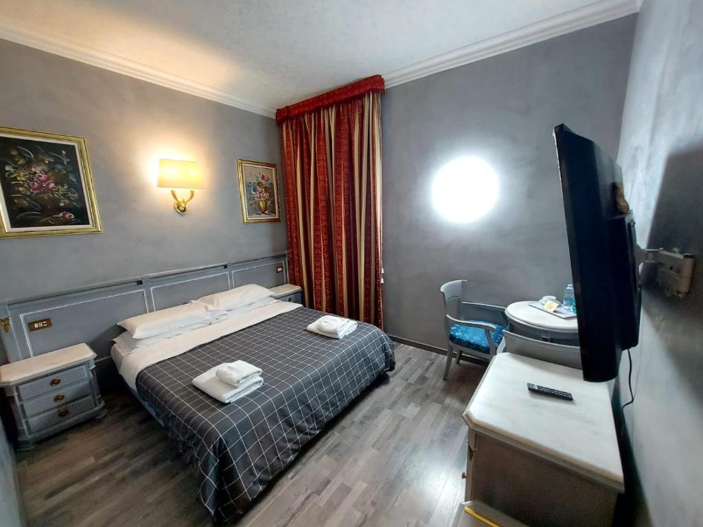 Letto o letti in una camera di Hotel Positano 2