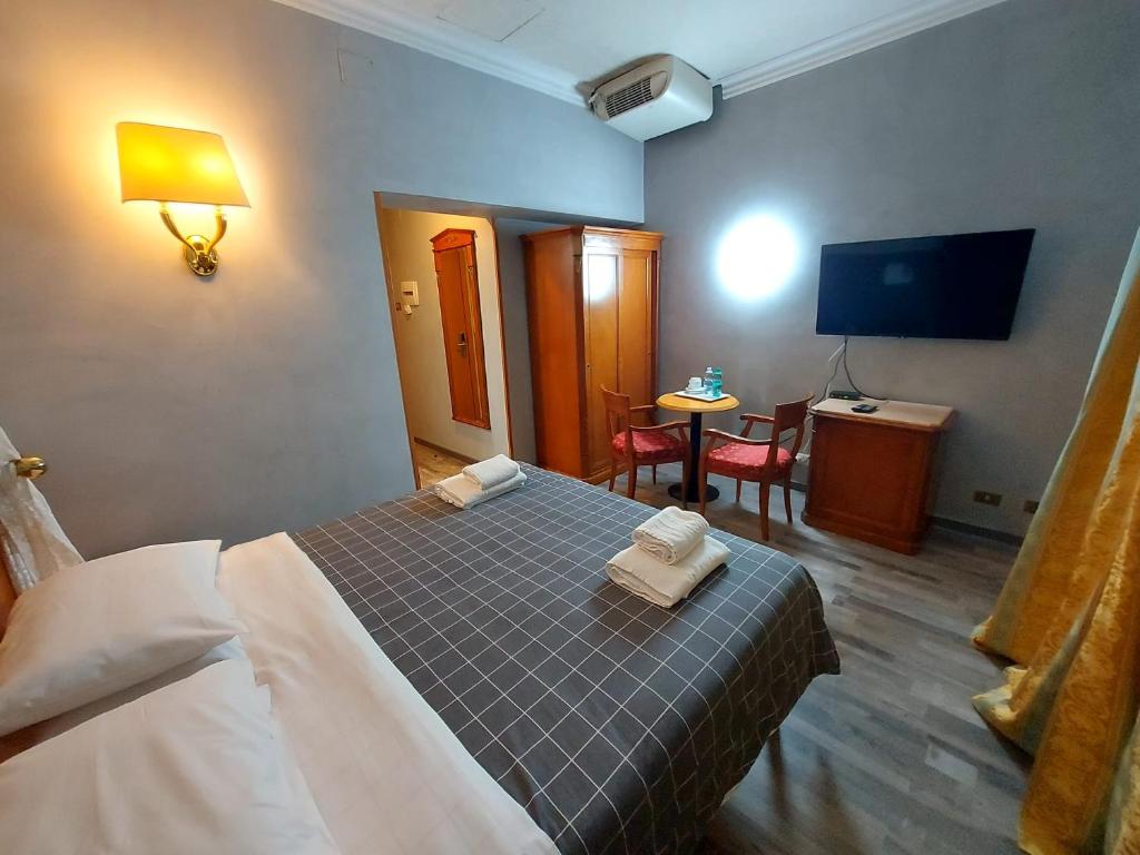 Letto o letti in una camera di Hotel Positano 2