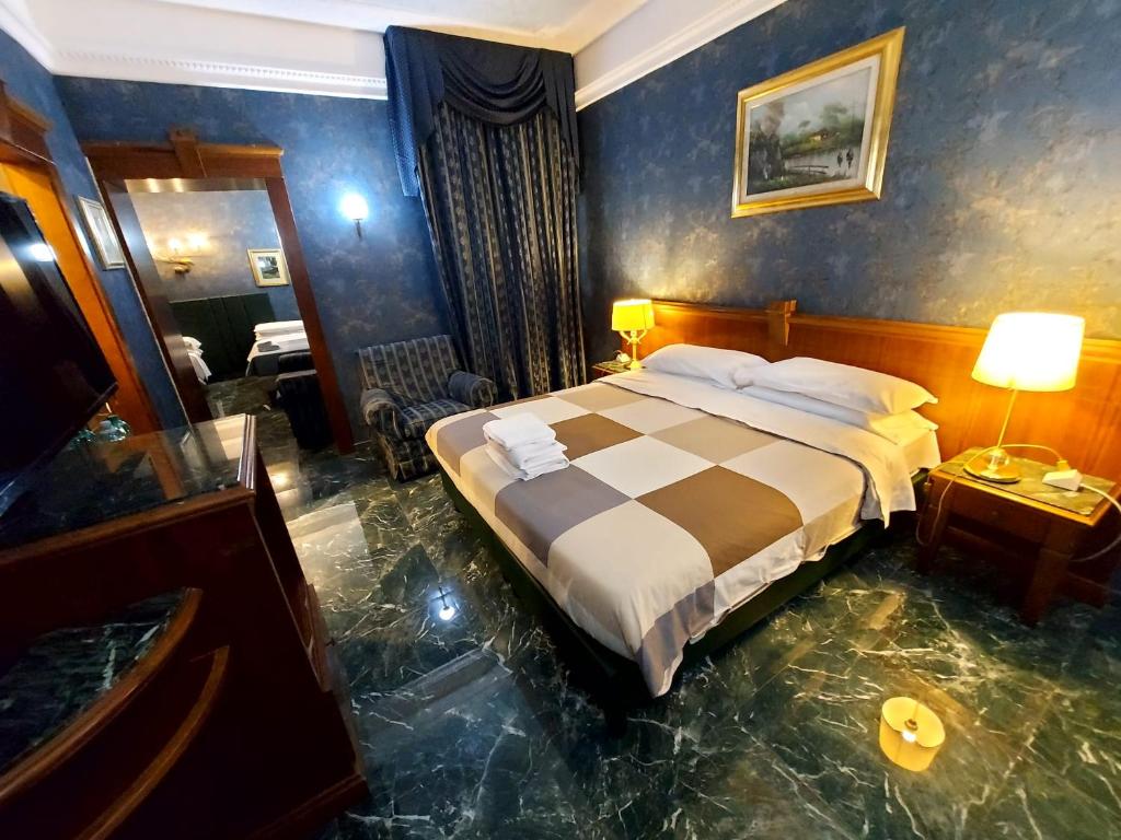 Letto o letti in una camera di Hotel Positano 2
