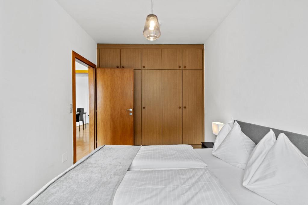 Postel nebo postele na pokoji v ubytování FarawayHomes Studio Fohnsdorf #1