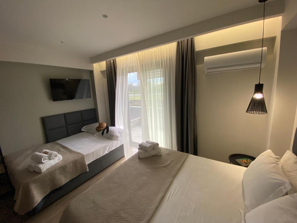 Katil atau katil-katil dalam bilik di Levanda suites