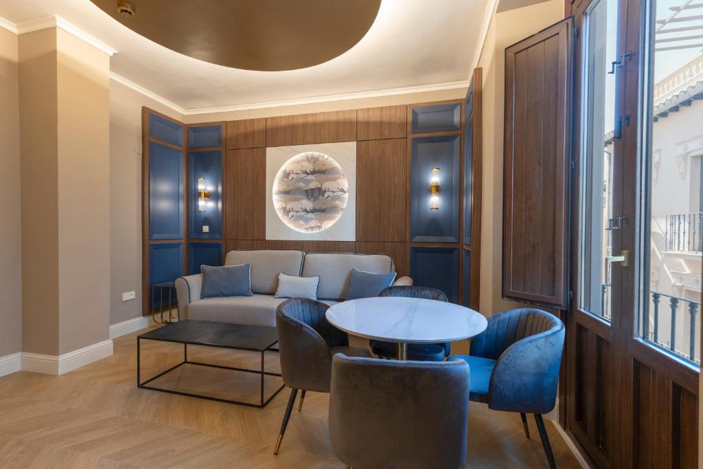 Posezení v ubytování BiBo Suites Palacio de Portago