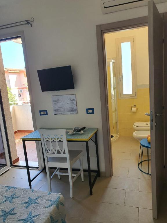 TV a/nebo společenská místnost v ubytování B&B da Nuccia Villasimius