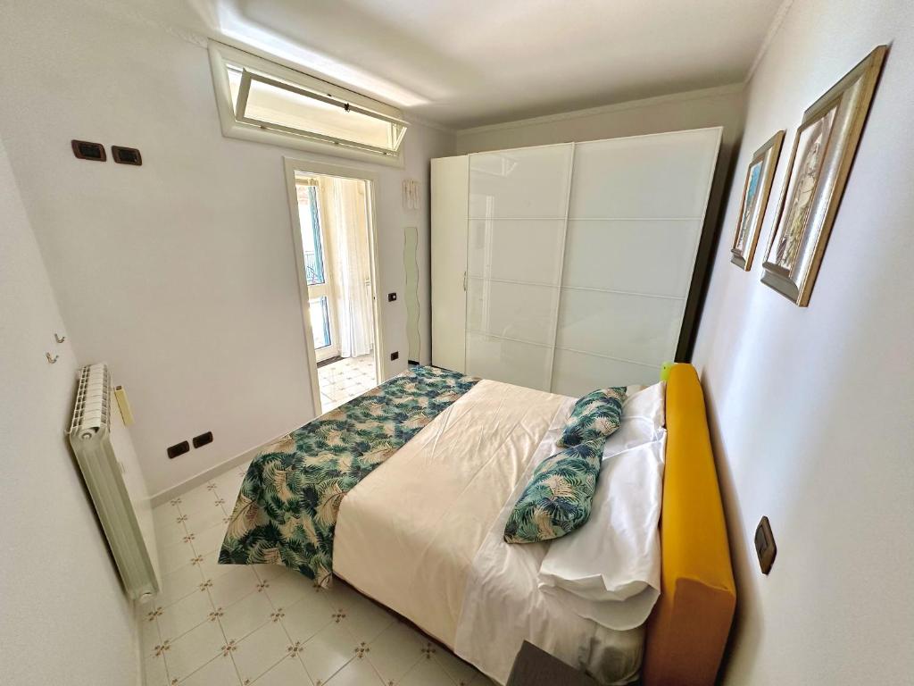 Postel nebo postele na pokoji v ubytování Villa Teresa con piscina costiera amalfitana