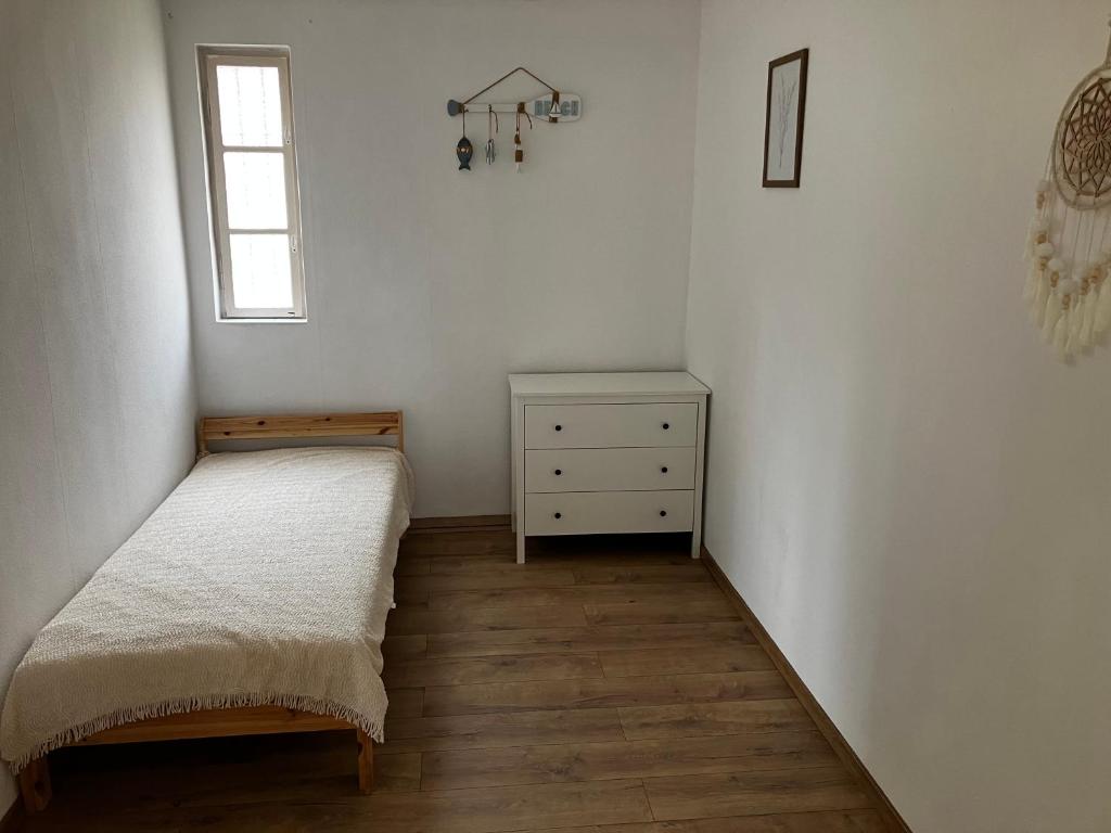 Voodi või voodid majutusasutuse VAMO's Apartment Balatonlelle toas