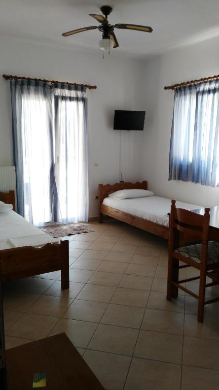 Posteľ alebo postele v izbe v ubytovaní Riverside Αpartments