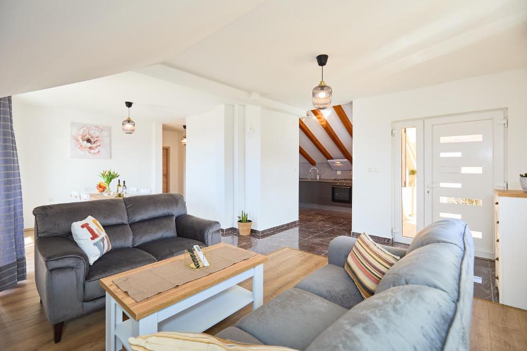 Гостиная зона в Apartment 2Home