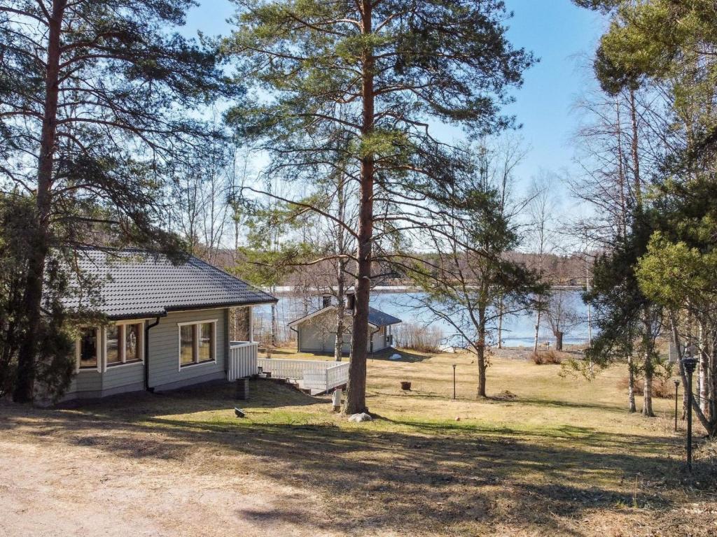a cottage with a view of the water at Holiday Home Ketunkolo by Interhome in Tampere