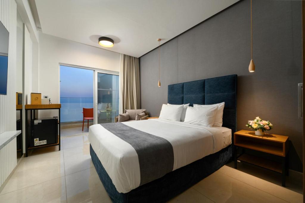 Postel nebo postele na pokoji v ubytování Ray Hotel Corfu