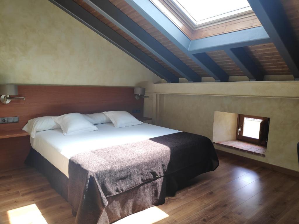 Postel nebo postele na pokoji v ubytování Hotel Las Leyendas