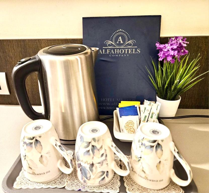 Príslušenstvo na prípravu kávy alebo čaju v ubytovaní Hotel Mythos