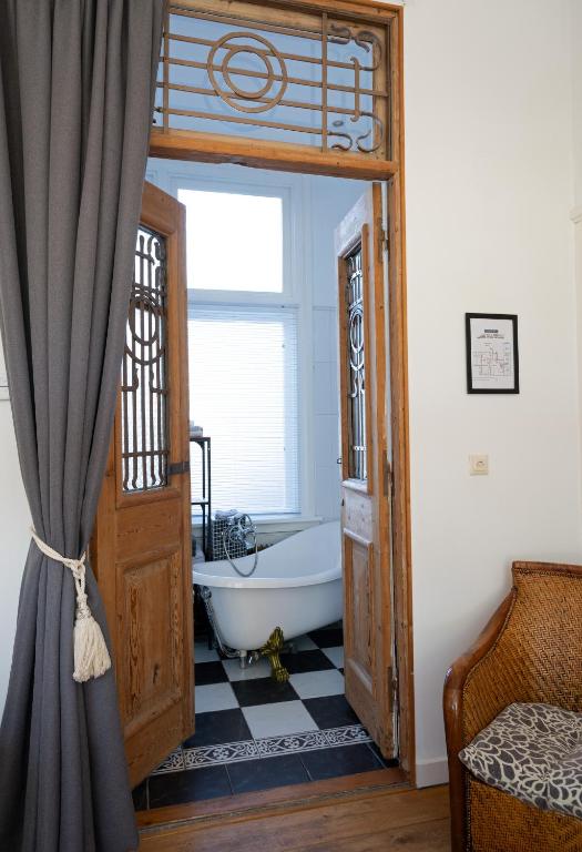 Postel nebo postele na pokoji v ubytování B&B Het Oude Postkantoor