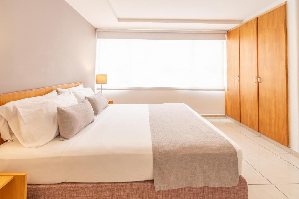 Postel nebo postele na pokoji v ubytování Basic Hotel Centenario by Hoteles MS